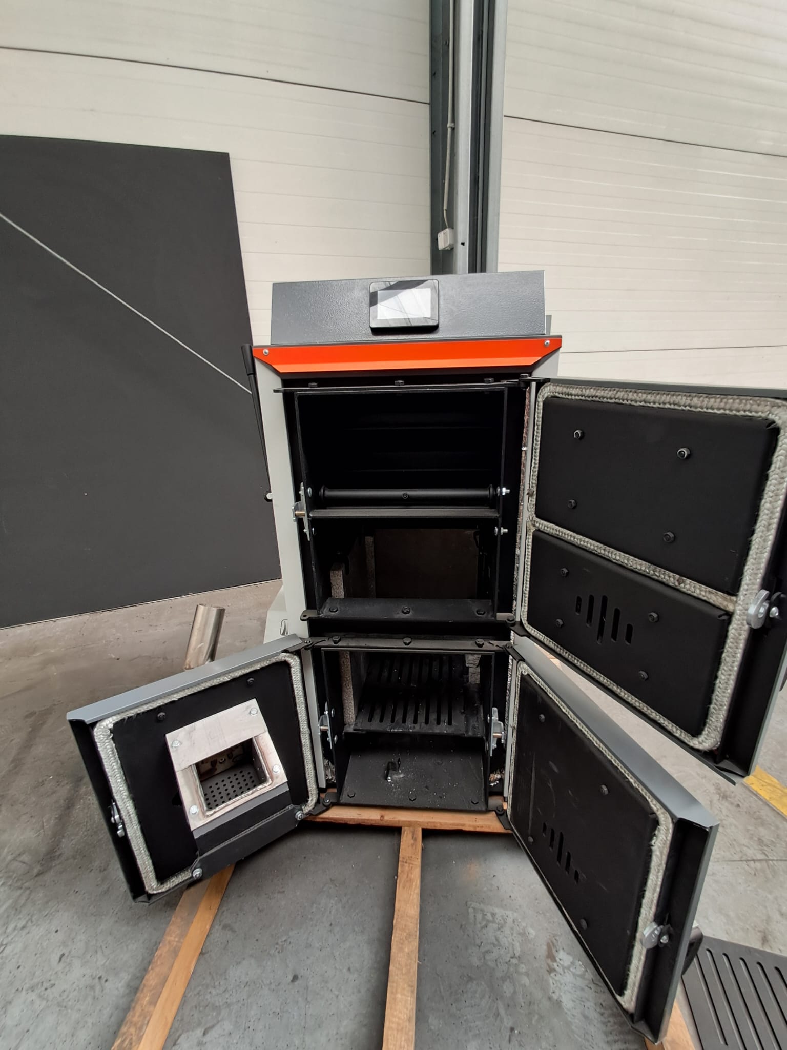 DSpell 20 Pelletkessel mit Zusatzrost für Holz