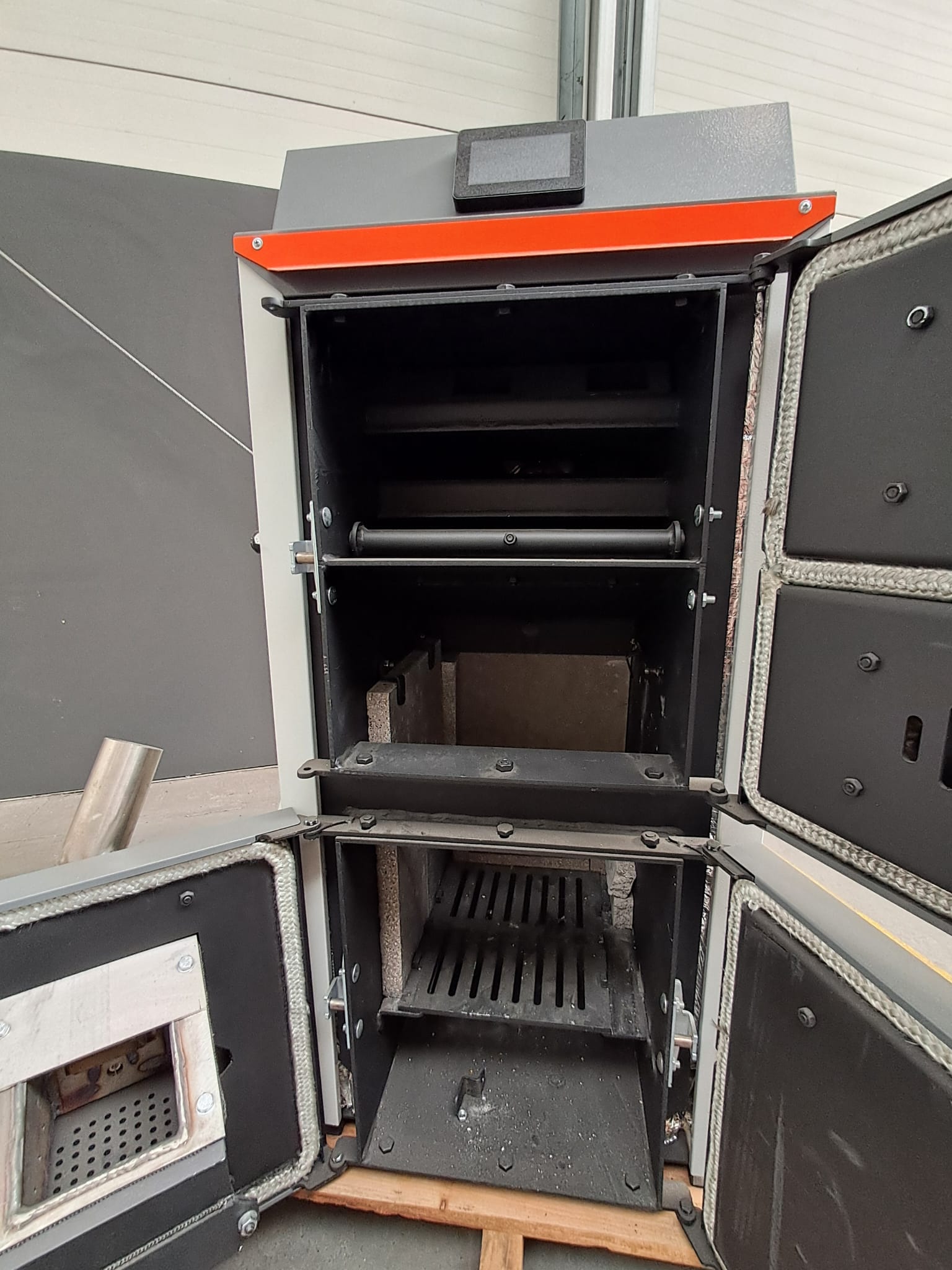 DSpell 20 Pelletkessel mit Zusatzrost für Holz