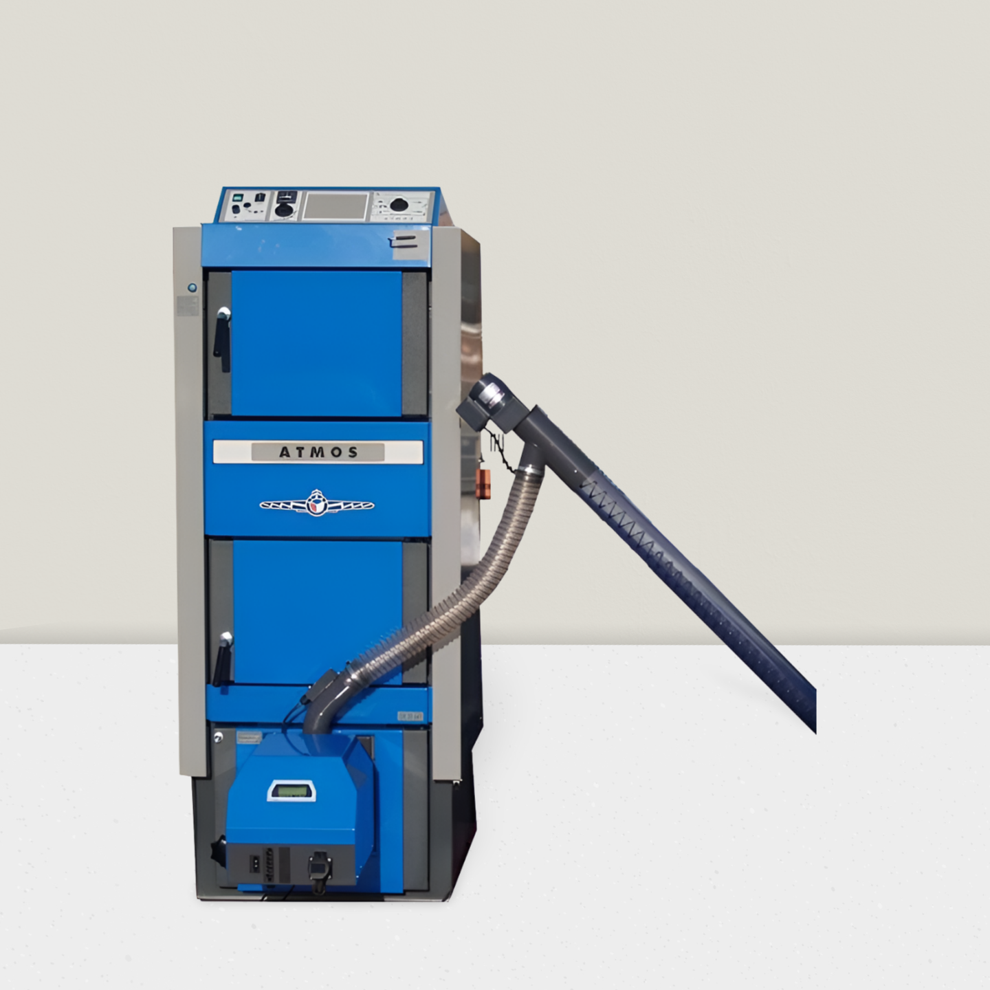Kombikessel 19 - 30 kW GSP von ATMOS für Holz und Pellets