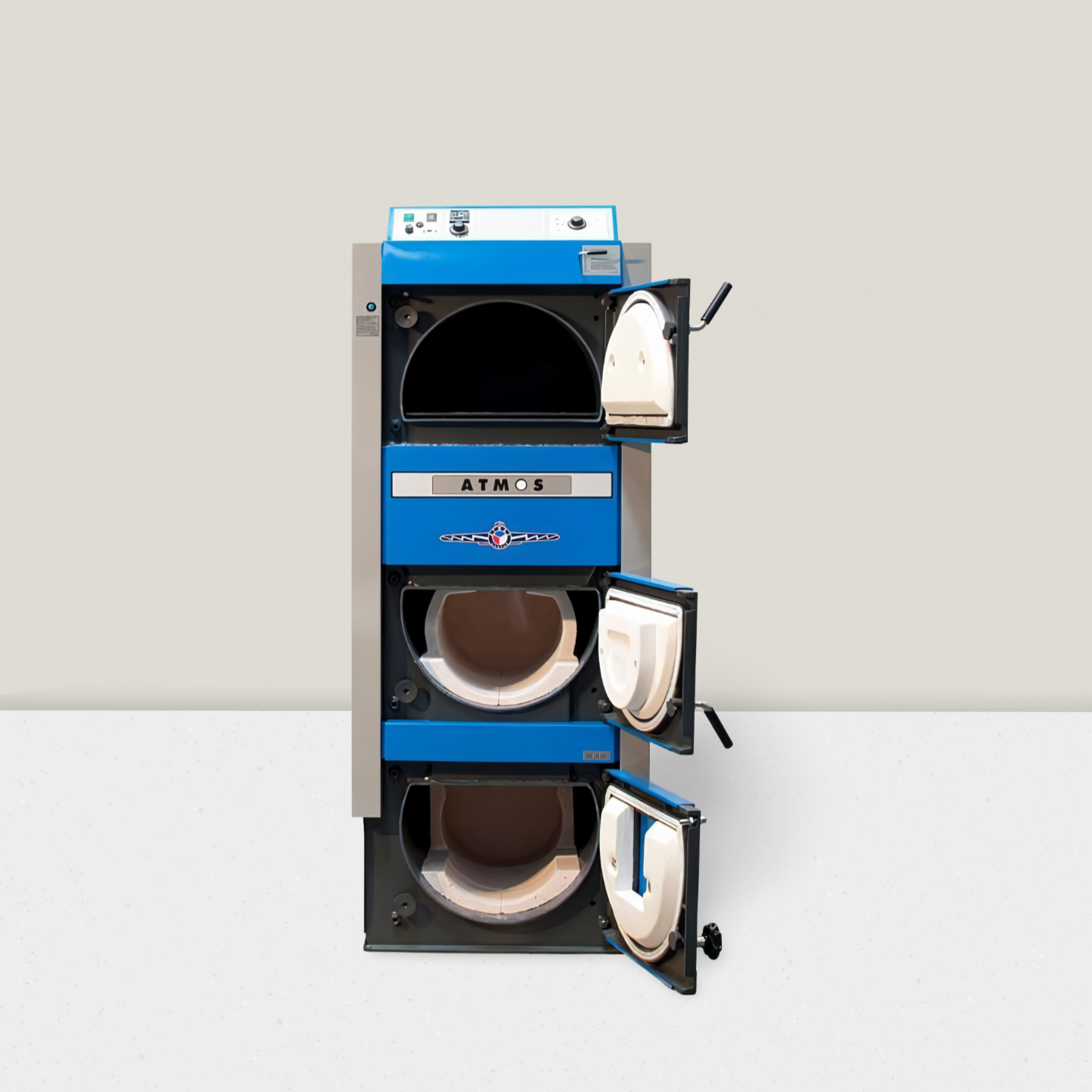 Kombikessel 19 - 30 kW GSP von ATMOS für Holz und Pellets