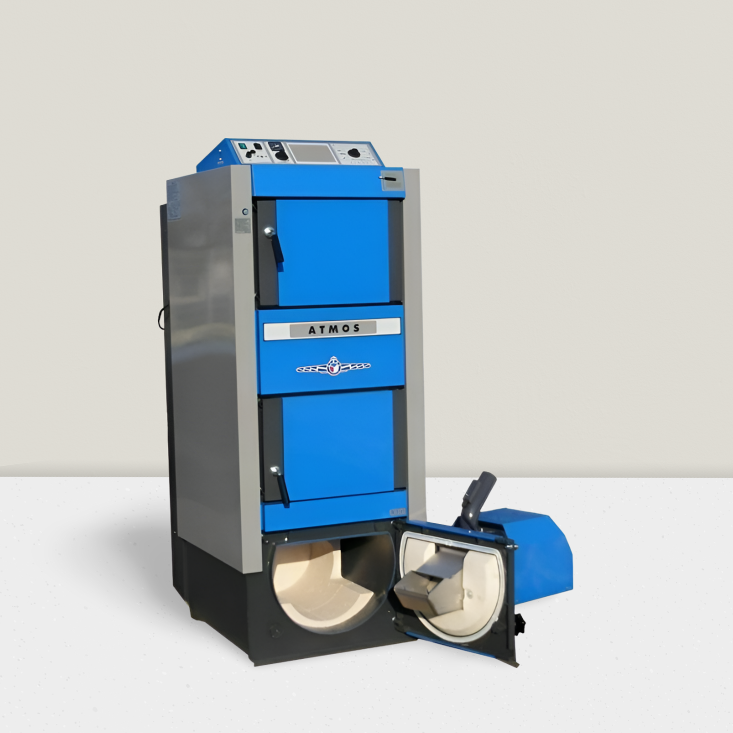 Kombikessel 19 - 30 kW GSP von ATMOS für Holz und Pellets